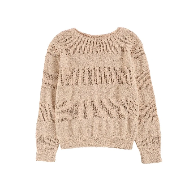 Hvordan genskaber man fluffiness af løse strikkede uldtrøjer med rundhalset pullover?